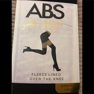 New with tags. Above the knee socks.